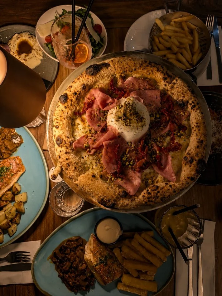 Sharing pizza and antipasti at Vitalia's